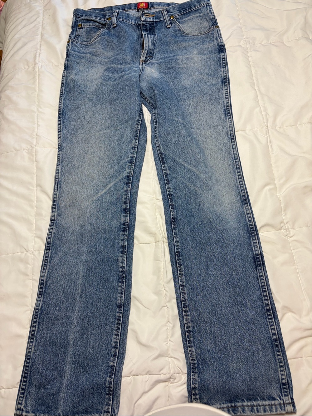 Wrangler Slim Fit Jeans in Blue with Gold Stitching